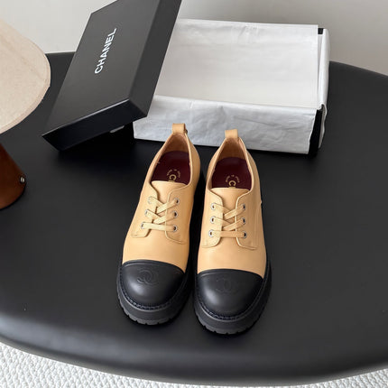 CHANEL 26S LACE UP PLATFORM IN BLACK AND BEIGE CALFSKIN