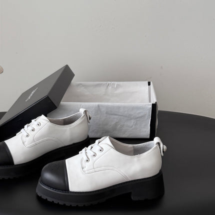 CHANEL 26S LACE UP PLATFORM IN BLACK AND WHITE CALFSKIN