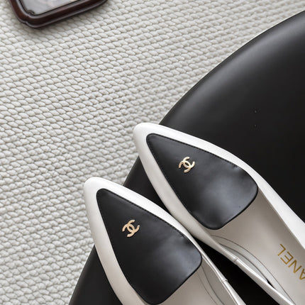 CHANEL 26S SLINGBACK FLAT IN BLACK AND WHITE CALFSKIN