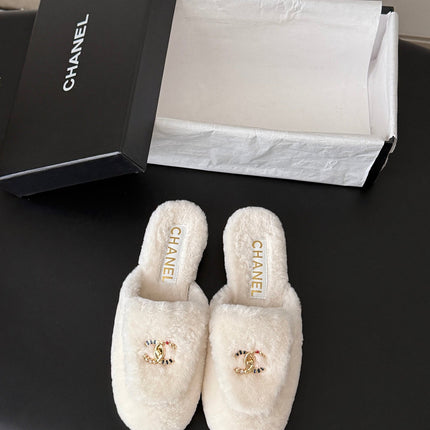 CHANEL 26S MULES IN WHITE SHEARLING LINING