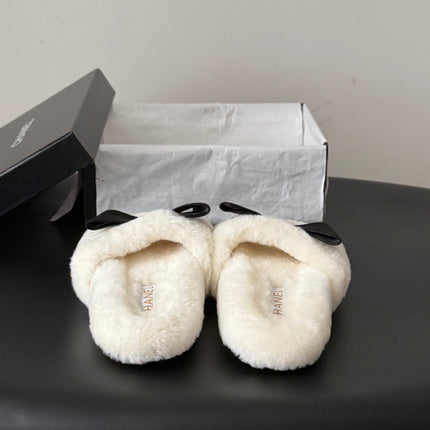 CHANEL 26S SLIDE SANDALS IN WHITE SHEARLING WITH BLACK BOW