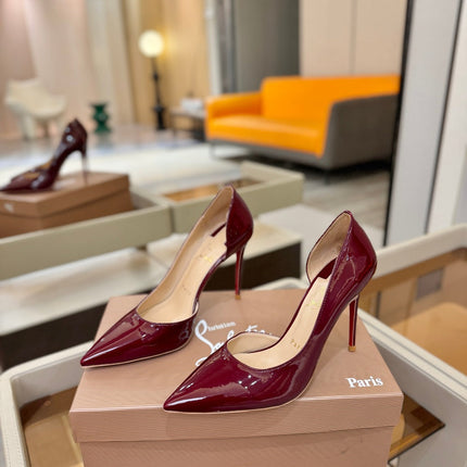CHRISTIAN LOUBOUTIN 26S CUTOUT SIDE PUMP HEELS 105 MM IN DARK RED PATENT CALFSKIN