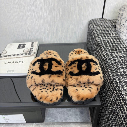 CHANEL 26S PLATFORM SLIDE SANDALS IN CAMEL AND BLACK SHEARLING DALMATIAN PRINT