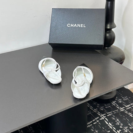 CHANEL 26S FLAT SLINGBACK IN WHITE AND BLACK POINTED-TOE LAMBSKIN