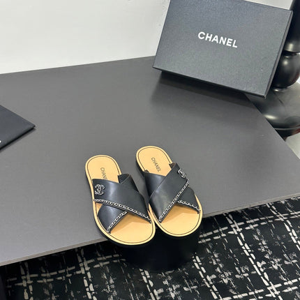CHANEL 26S CROSS-STRAP SANDALS IN BLACK LEATHER
