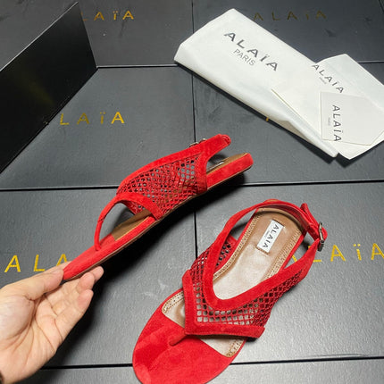 ALAIA 26S FLAT MESH THONG SANDALS IN RED SUEDE