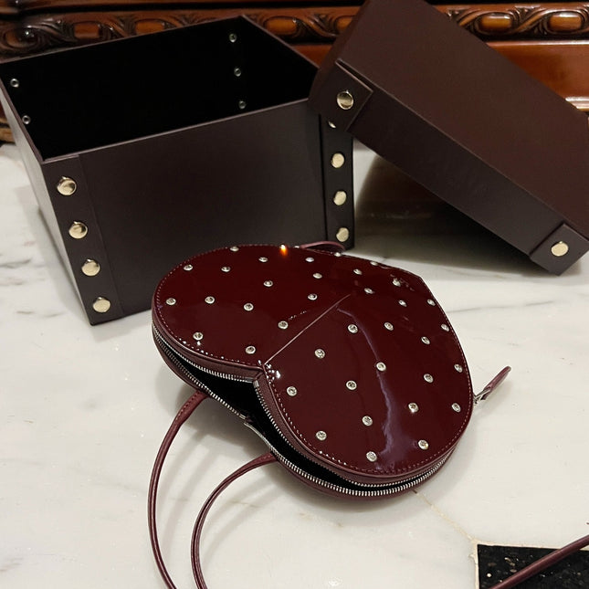 LE COEUR BAG 21 IN BURGUNDY RED PATENT CALFSKIN ATTACHED STRASS
