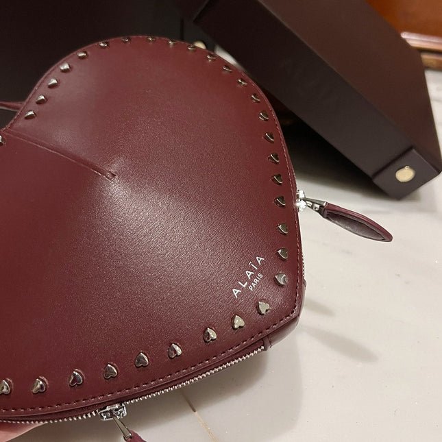 LE COEUR BAG 21 IN BURGUNDY RED CALFSKIN WITH STUDDED HEART