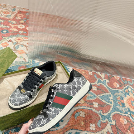 GUCCI 26S SCREENER SNEAKER IN BLACK AND WHITE GG CANVAS
