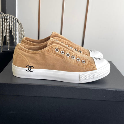 CHANEL 26S LOW TOP BEIGE IN NAVY BLUE CANVAS