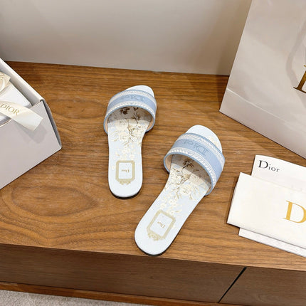 DIOR 26S FLAT SLIDE SANDALS IN LIGHT BLUE CANVAS