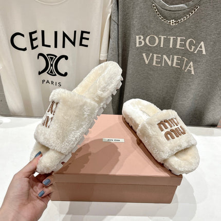 MIUMIU 26S FLAT SLIDES IN CREAM BEIGE SHEARLING