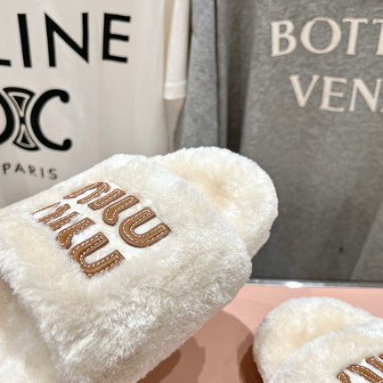 MIUMIU 26S FLAT SLIDES IN CREAM BEIGE SHEARLING
