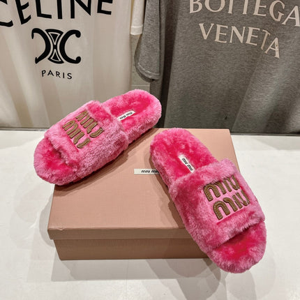 MIUMIU 26S FLAT SLIDES IN PINK SHEARLING