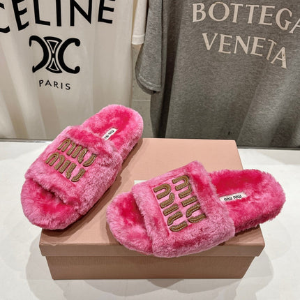 MIUMIU 26S FLAT SLIDES IN PINK SHEARLING