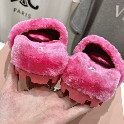 MIUMIU 26S FLAT SLIDES IN PINK SHEARLING