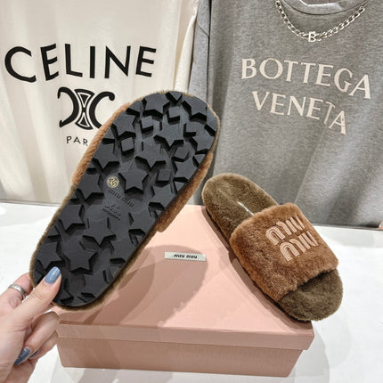 MIUMIU 26S FLAT SLIDES IN BROWN SHEARLING