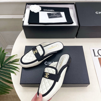 CHANEL 26S MULES IN WHITE LAMBSKIN AND BLACK FABRIC