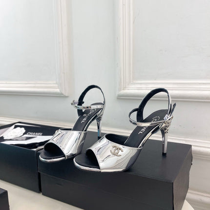 CHANEL 26S HIGH HEEL SLINGBACK SANDALS 90 MM IN SILVER LAMBSKIN WITH CC LOGO
